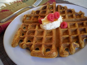 Pumpkin Ginger Waffles topped with whipped cream