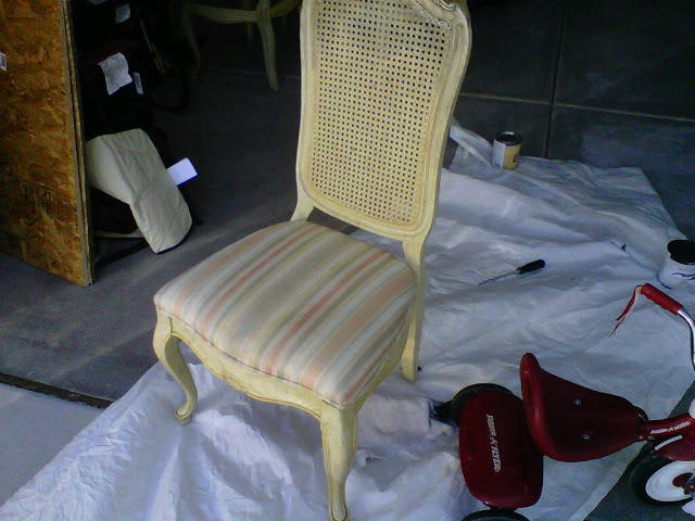 Old thrift store chair in beige with 1980's striped fabric