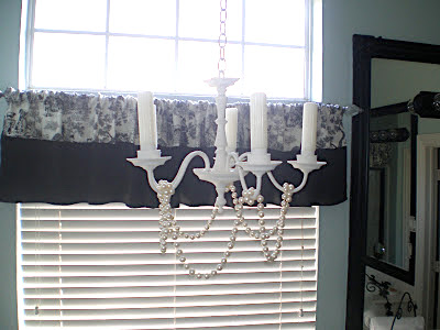 Candle Chandelier above the tub in Can you spray paint bathroom faucets