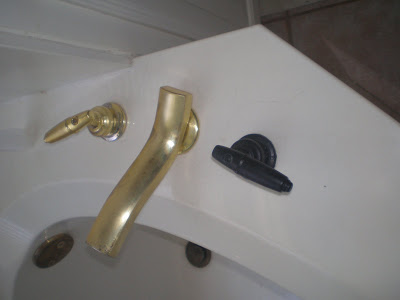 Spray painting bathtub faucets Before and After