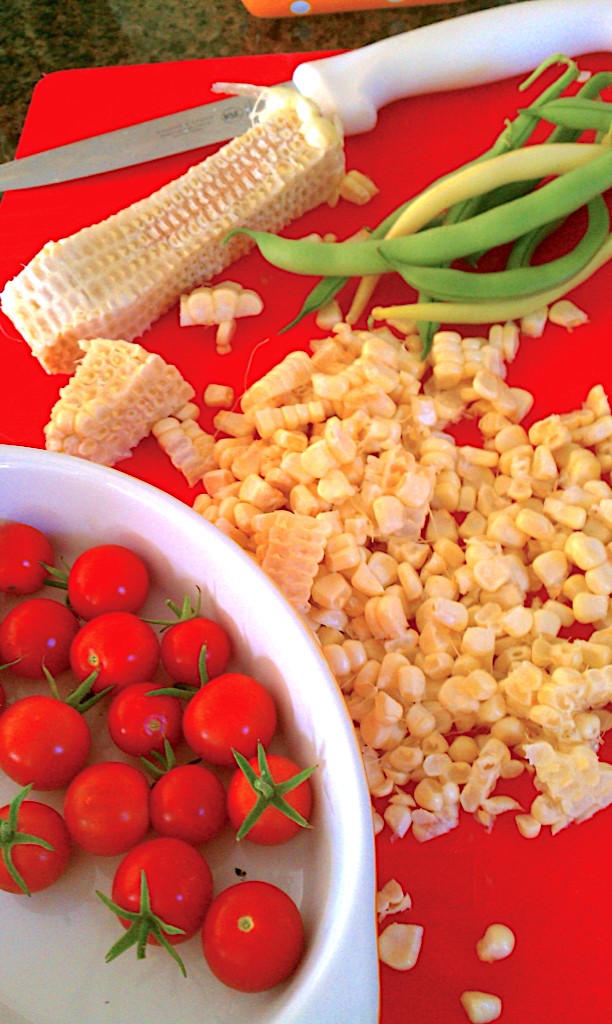 cutting corn off cob for pasta dish