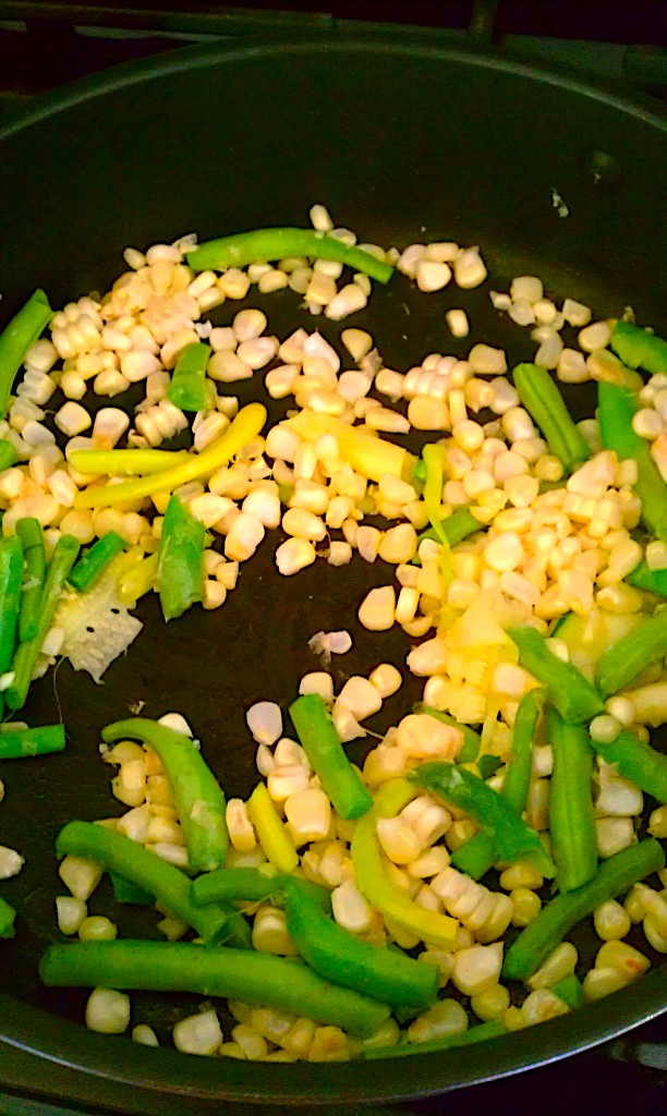 sauteing corn and green beans