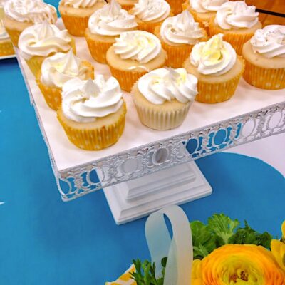 Cupcake Dessert Table for 200! Scalloped Tablecloth and Hot Air Balloon Decorations