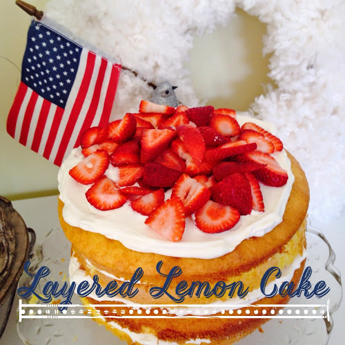 Layered Lemon Cake with whipped cream and fruit