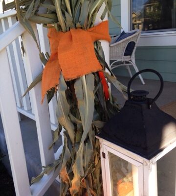 Fall porch corn stalks and pumpkin topiaries