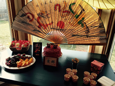 Chinese fan decor, Chinese birthday party, PIn the Eye on the dragon- The Style Sisters