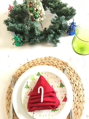 Red Christmas tree napkin fold, Winter wonderland tablescape, bright colors for Christmas, Lime Green and red for Christmas The style sisters tablescape
