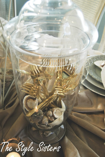 beachy tablesacpe gold forks in apothecary jar