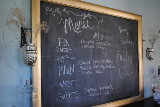 Gold framed chalkboard with menu 