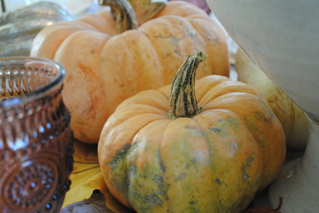 Fall centerpice peach colored pumpkins