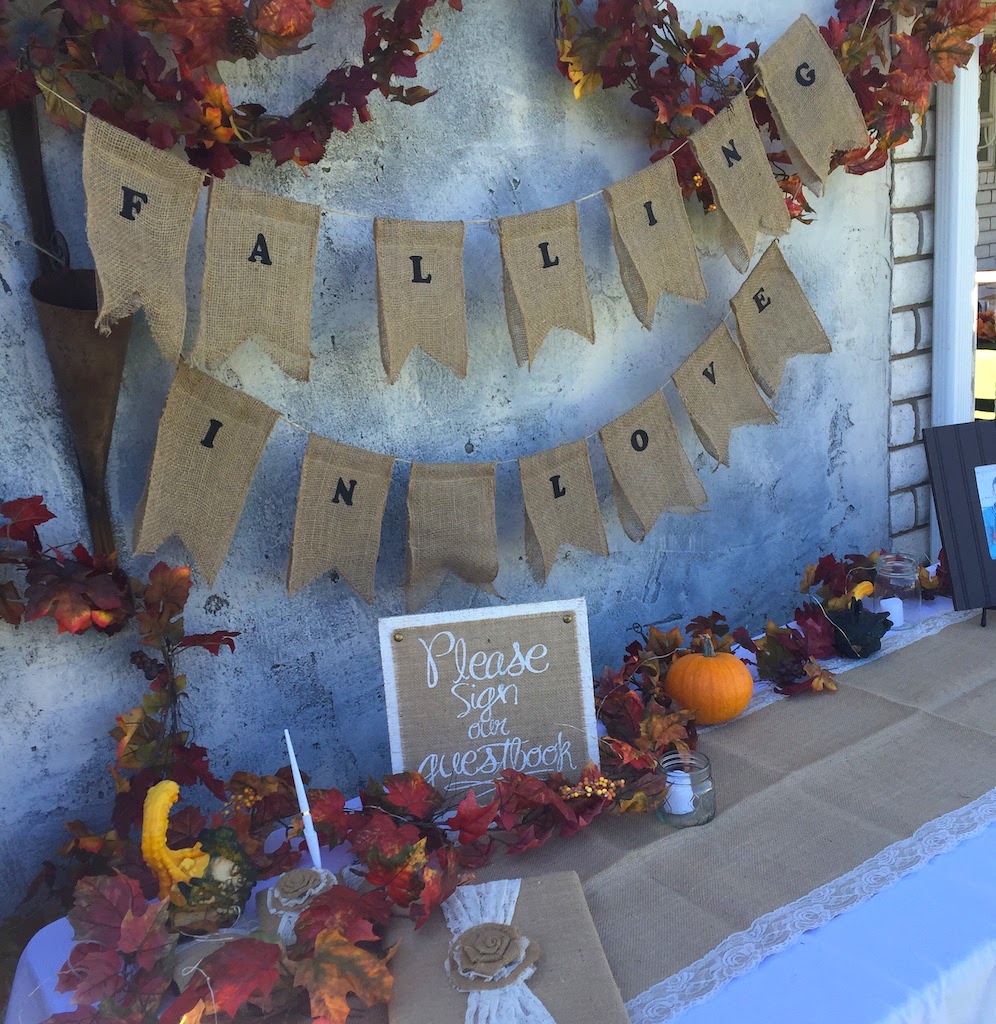 Easy outdoor fall wedding guest book signing area. Easy outdoor rustic fall wedding reception. Wedding reception ideas at home
