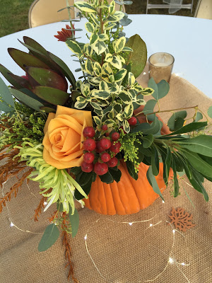 Pumpkins with flowers wedding  centerpiece. Rustic wedding centerpiece. Costco flowers in pumpkins  