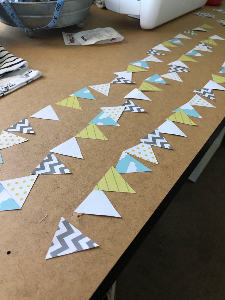 scrapbook triangles make garland for hot air balloon