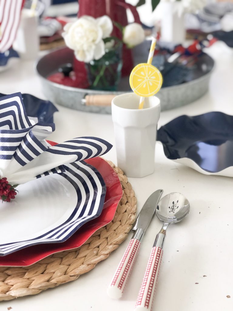 red and white handled pottery barn cutlery