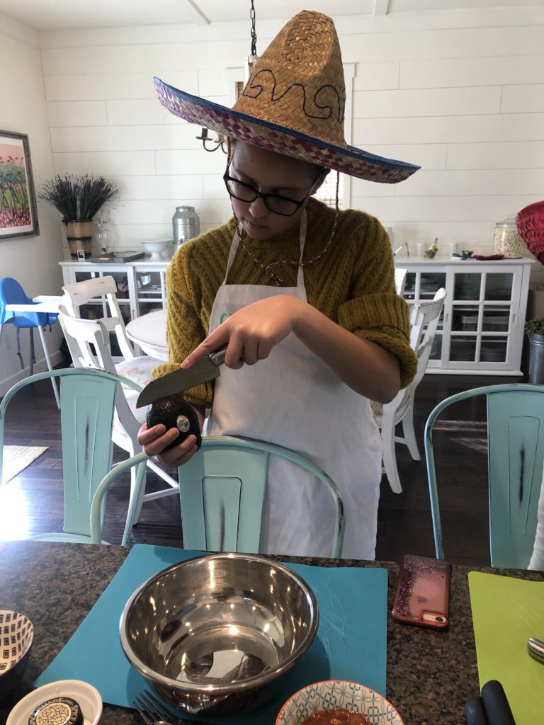 Kids learning how to make tacos