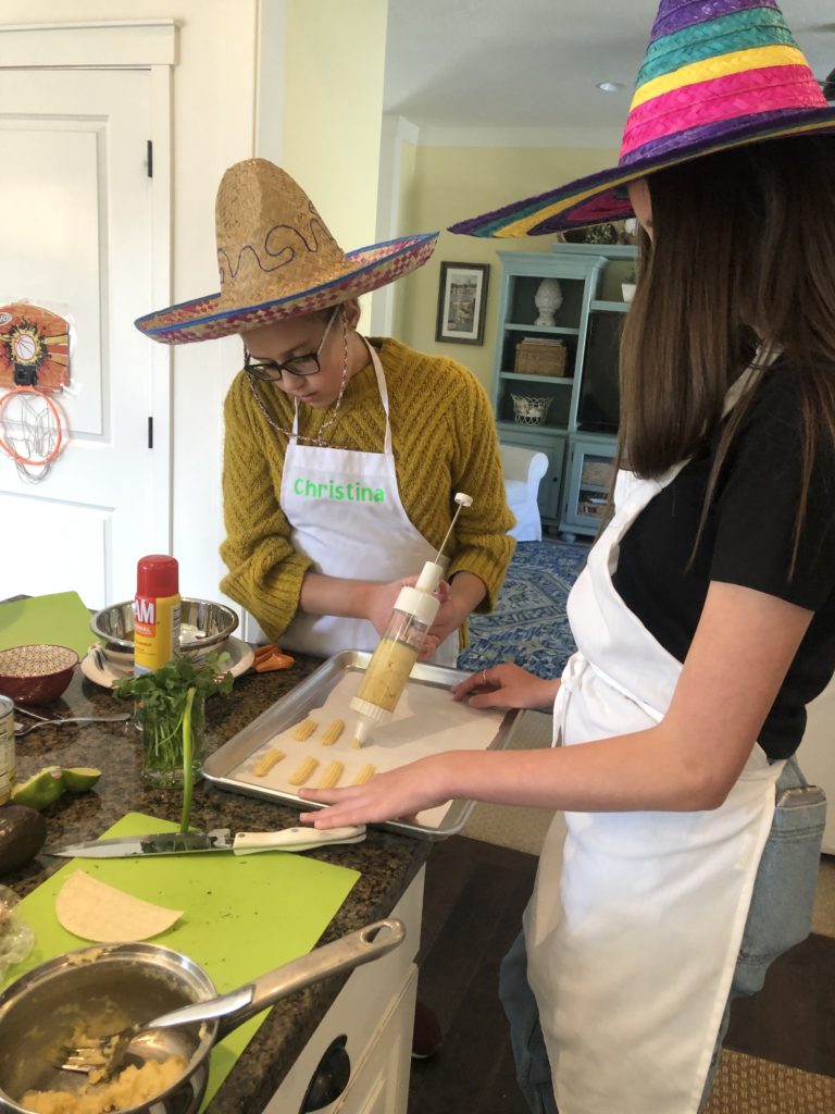 using a cookie press to make mini churros