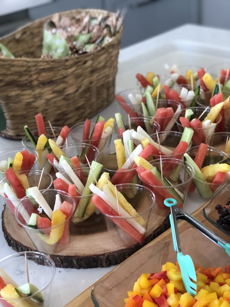  Veggie/fruit cups filled with watermelon, cucumber, jicama and pineapple spears