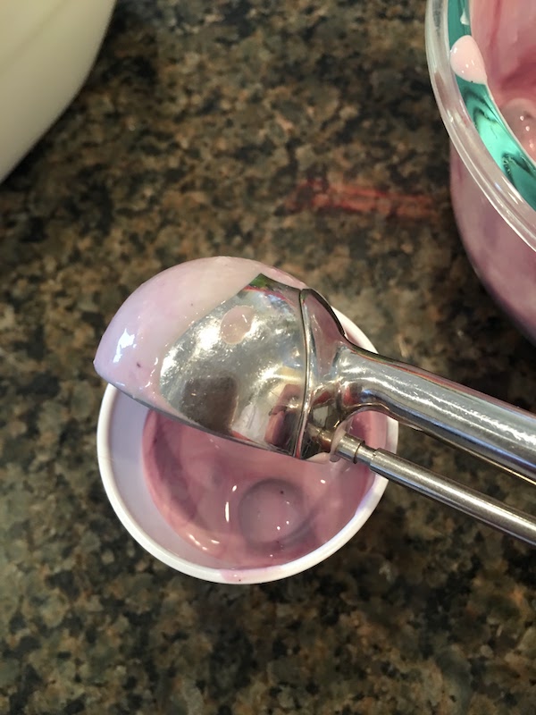 ice cream scoop blueberry mixture into cups