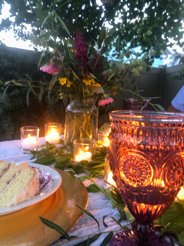 Romantic outdoor grilled dinner tablescape with pioneer woman goblet 