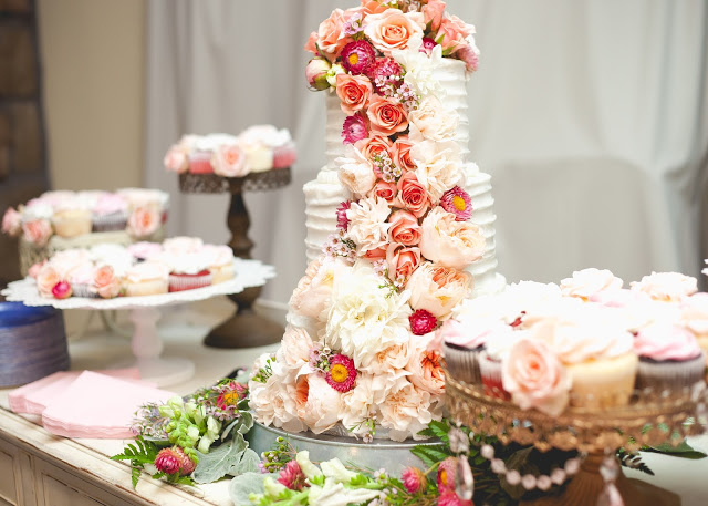 wedding cake with flowers cascading 