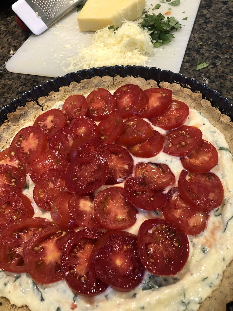 tomato ricotta basil tart ready to go in oven