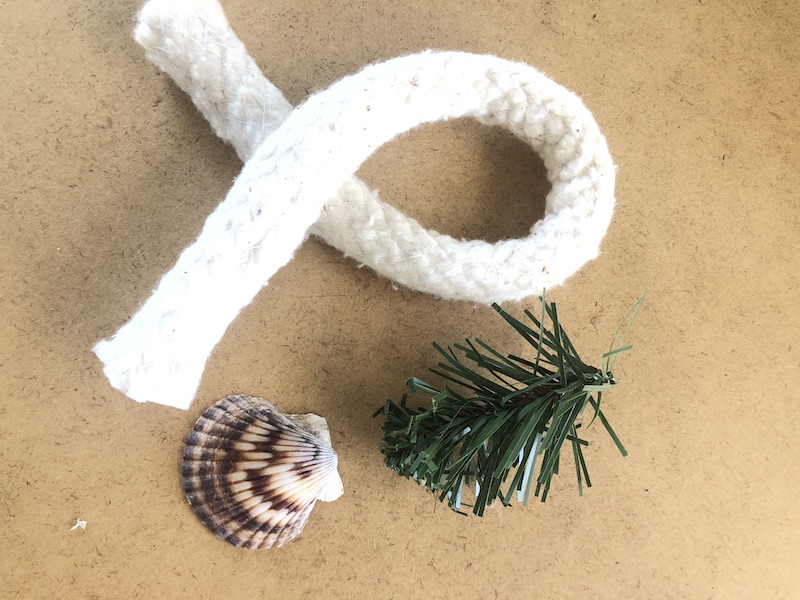 Supplies to make Coastal Christmas napkin rings and place settings