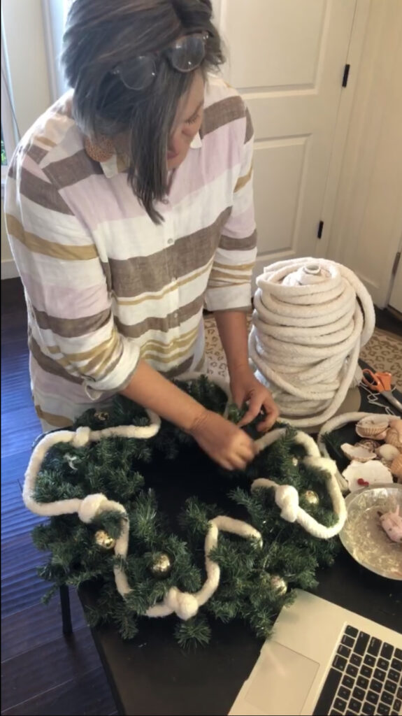 Adding in cotton piping to Coastal Christmas wreath