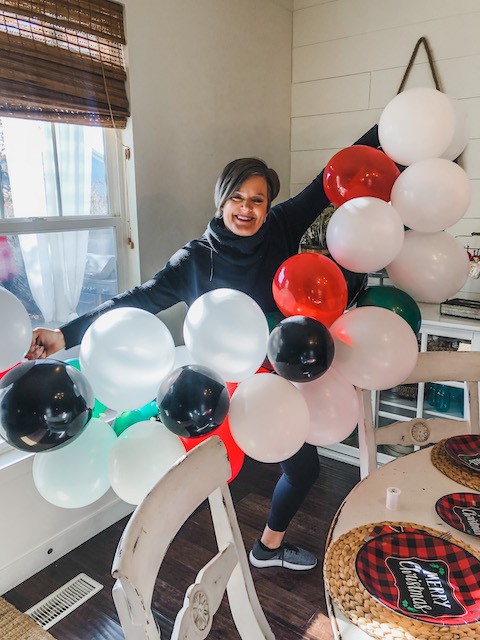 https://karinskottage.com/wp-content/uploads/2020/12/karins-holding-balloon-arch.jpg