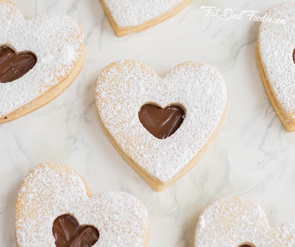 Heart shaped sugar cookies with nutella filling