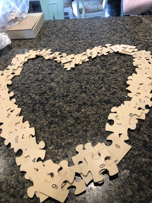 repurpose thrift store wooden puzzle pieces 