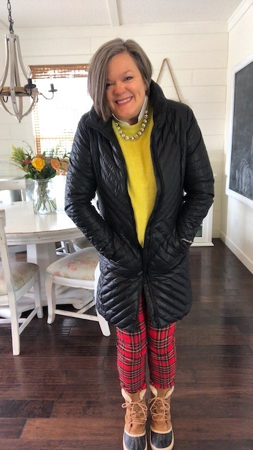 Back coat over red tartan plaid pants