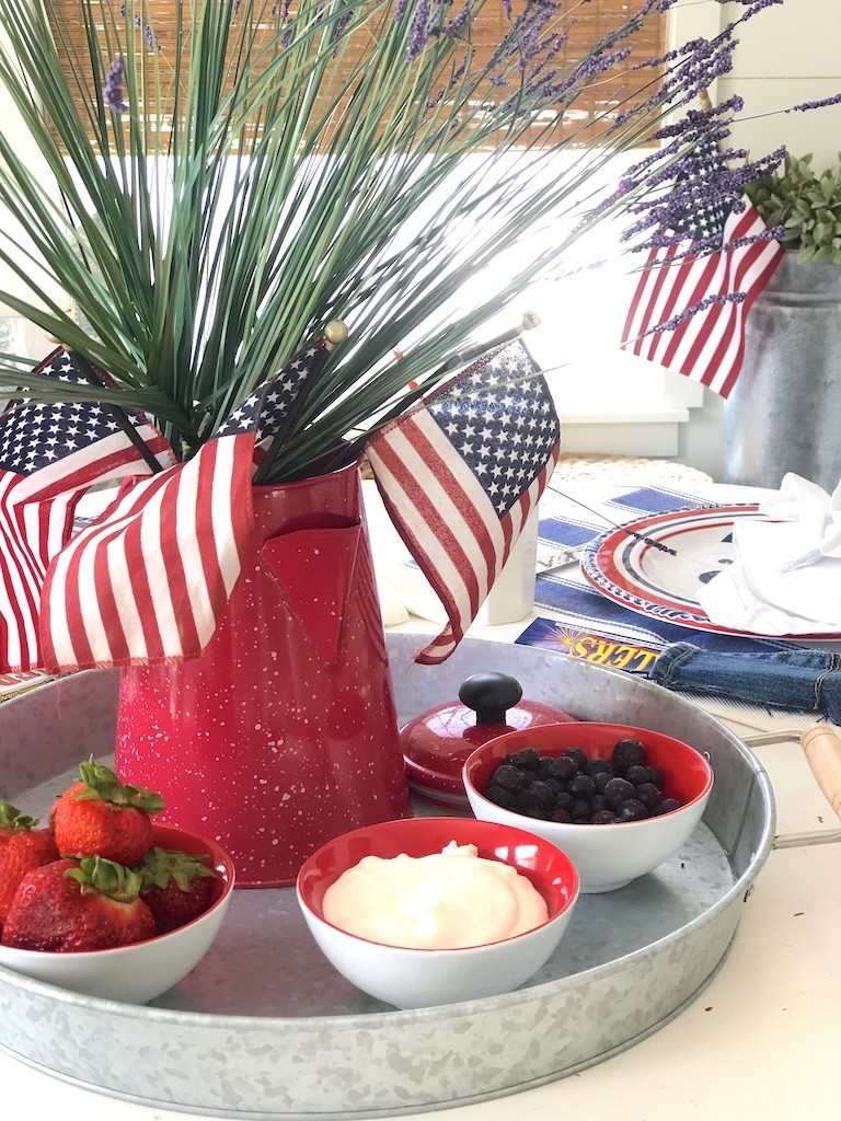 red white blue centerpiece with pancake toppings for the 4th of July