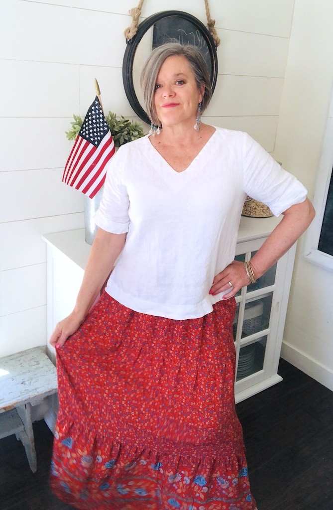 red flowy skirt white linen top 