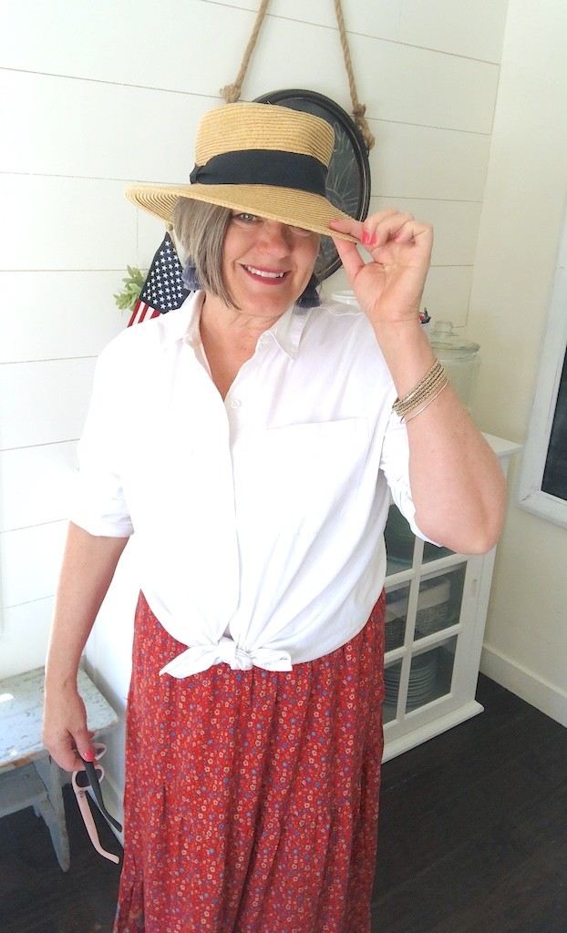 straw hat with knot tied blouse