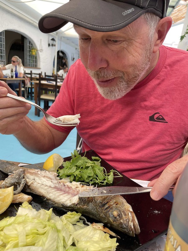 Eating fish on Tremiti islands
