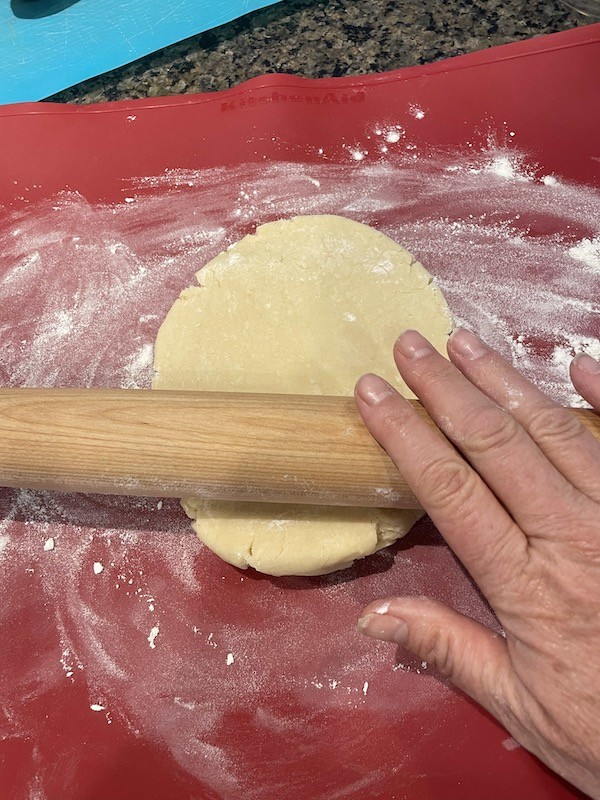 rolling out pie dough