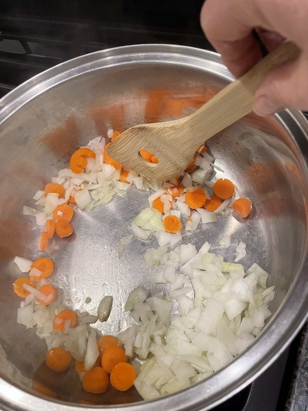 sauteeing carrots and onions 