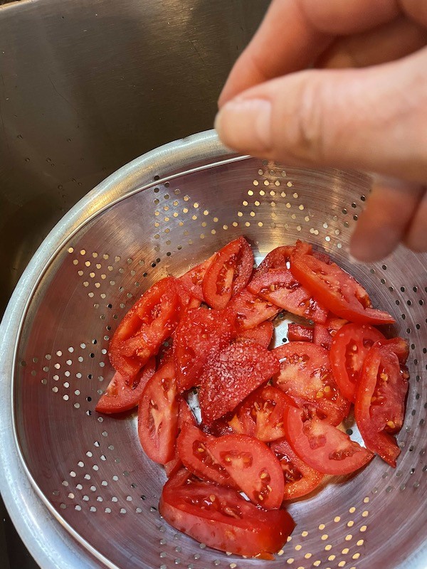 tomatoes with salt in colander- Karins Kottage