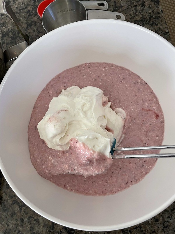 folding whip cream into pink arctic salad 