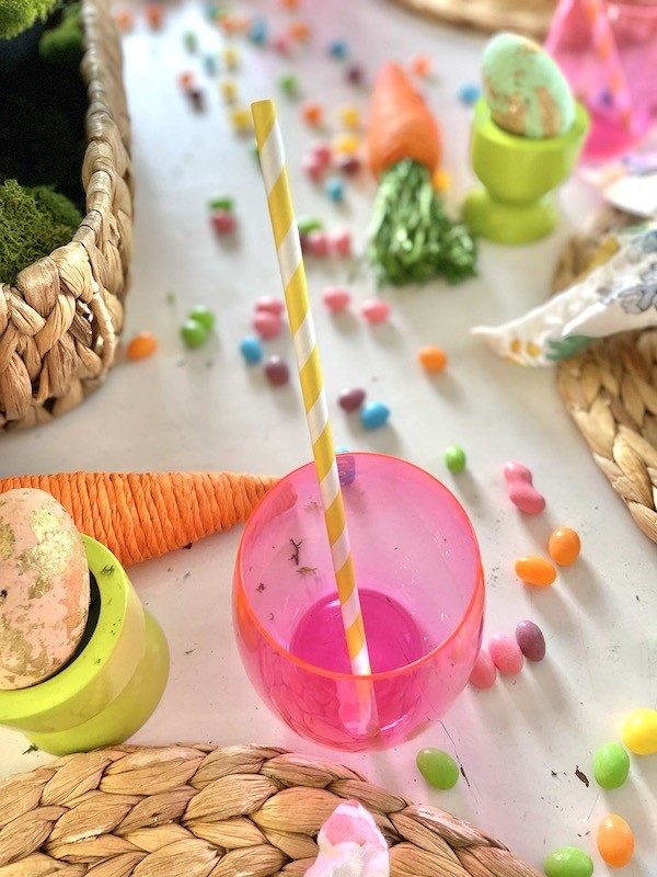 Plastic pink cups for kids Easter table
