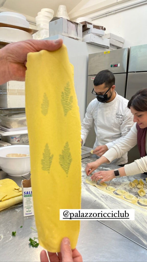 Making fresh herb pasta  in Italy