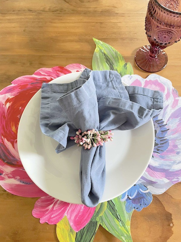Spring place settings with floral paper placemats