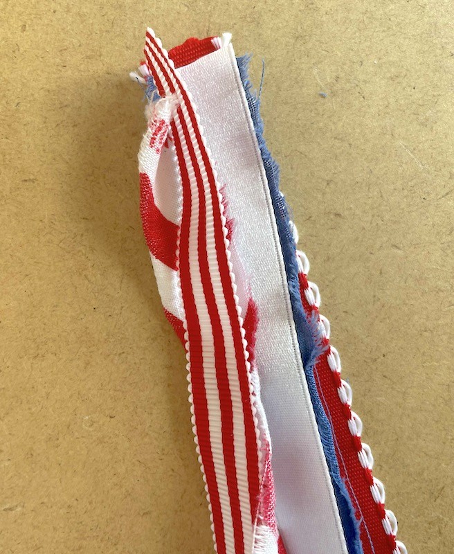 layering ribbon to make patriotic red white and blue ribbon want