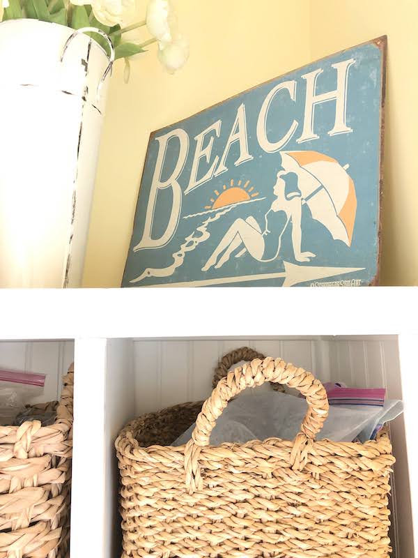 metal beach sign mud room built ins
