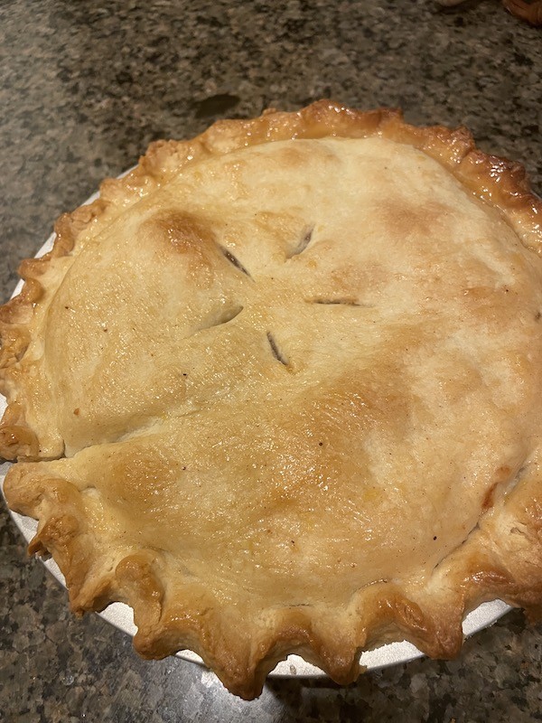 Summer Bliss: A Delicious Peach Pie Recipe from Baking a Moment