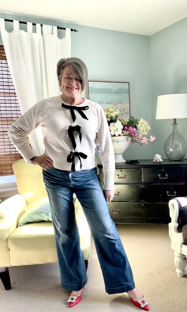 How to Style a Cream Bow Sweater 4 Ways for the Holidays