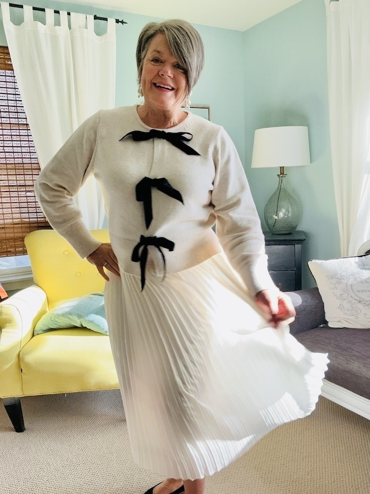 How to Style a Cream Bow Sweater 4 Ways for the Holidays