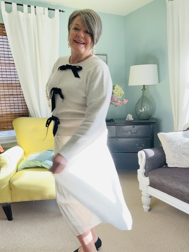 How to Style a Cream Bow Sweater 4 Ways for the Holidays