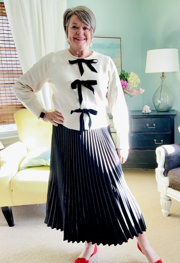 How to Style a Cream Bow Sweater 4 Ways for the Holidays