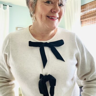 How to Style a Cream Bow Sweater 4 Ways for the Holidays